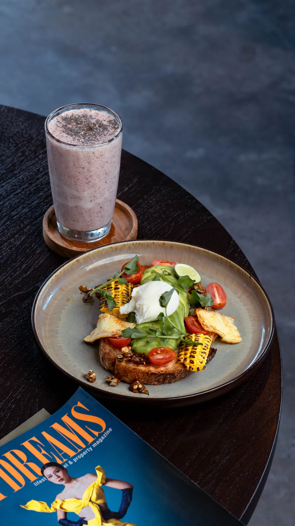 Avocado toast with poached egg and a berry smoothie