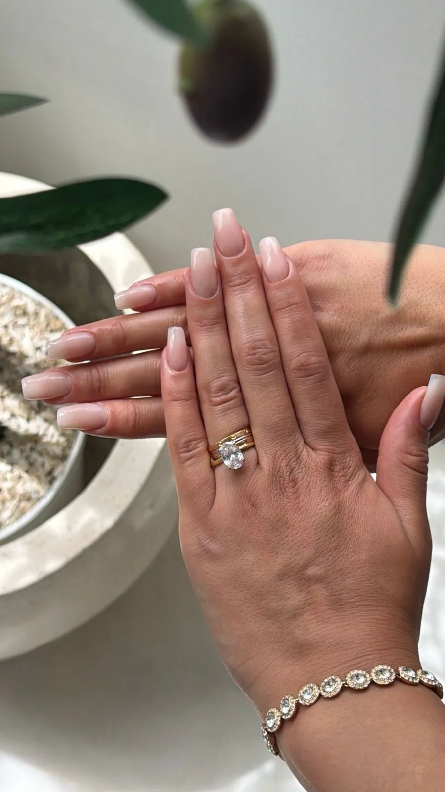 Glossy nude square nails at Nāilu